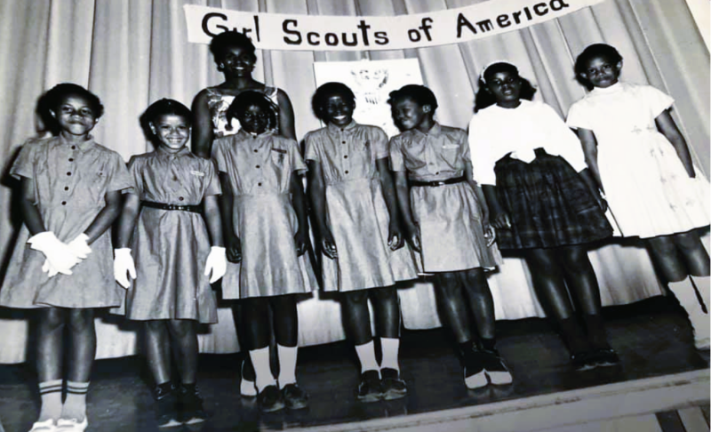 Brownie Troop 1963. Shown are (l-r) Rosetta Lee, Sarah Daisey Minor, Bonita Johnson, Delemita Johnson, Georgia Lee Edwards Perry, Wanda Gibbs Witherspoon and Helena “Fran” Stewart. In back is Trooper Leader Elizabeth “Lib” Stewart. SOURCE: MEMORIES OF LEWES FACEBOOK PAGE